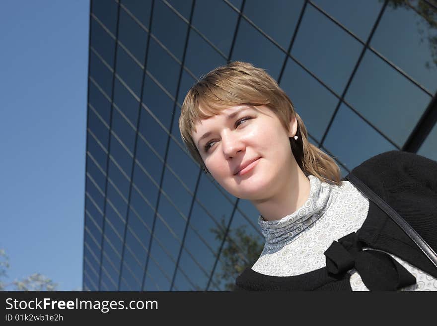 Portrait of girl on a skyscraper background. Portrait of girl on a skyscraper background