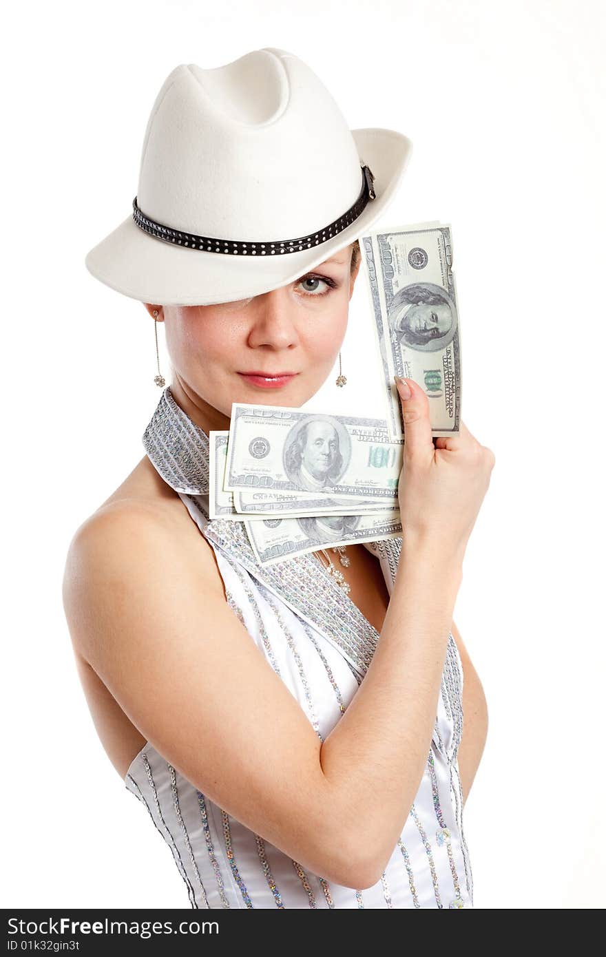 Young pretty woman in white hat and striped suit with money in hand