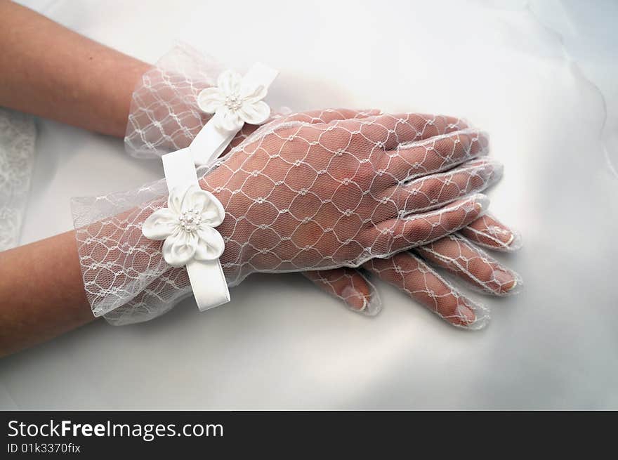 Hands of young bride on the evening dress. Hands of young bride on the evening dress