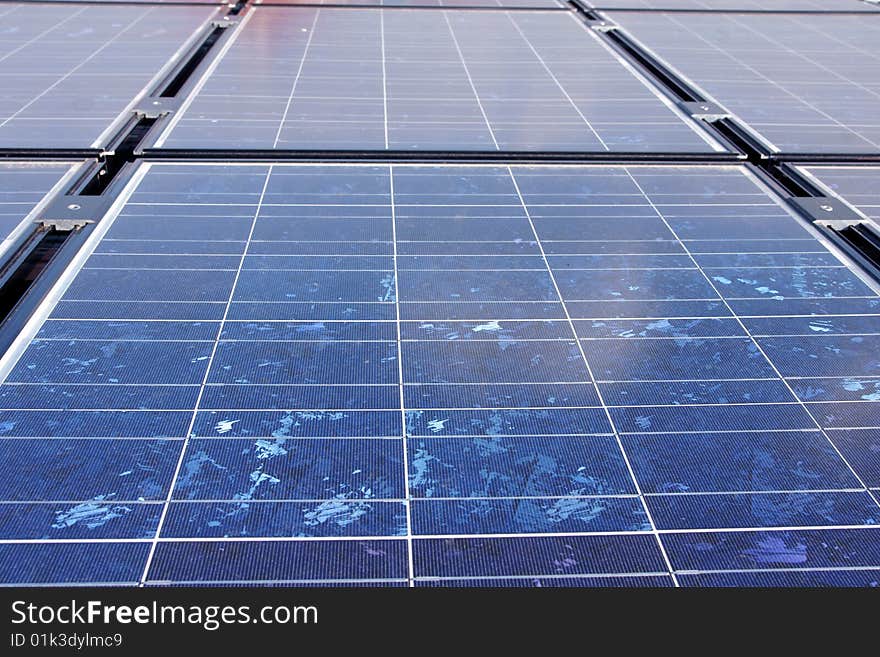 A close-up showing the detail of a silicone solar panel. A close-up showing the detail of a silicone solar panel.