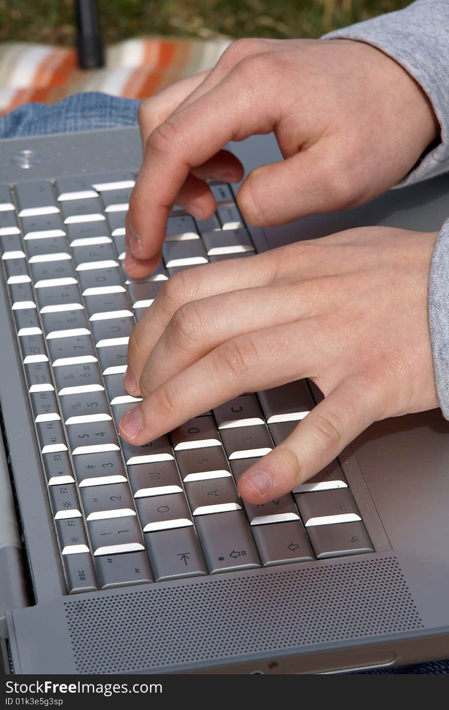 Man s Hands Typing at laptop