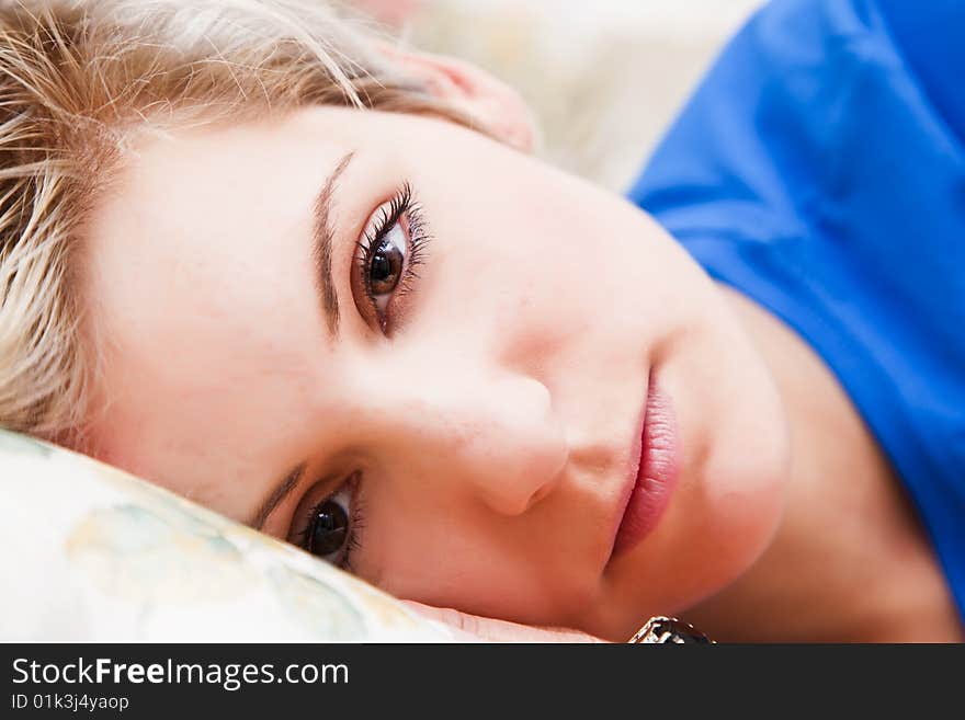 Young woman portrait still in bed. Young woman portrait still in bed.