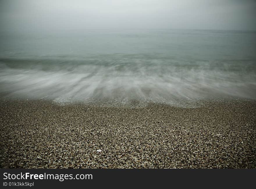 Long exposed waves dying in the shore. Long exposed waves dying in the shore.