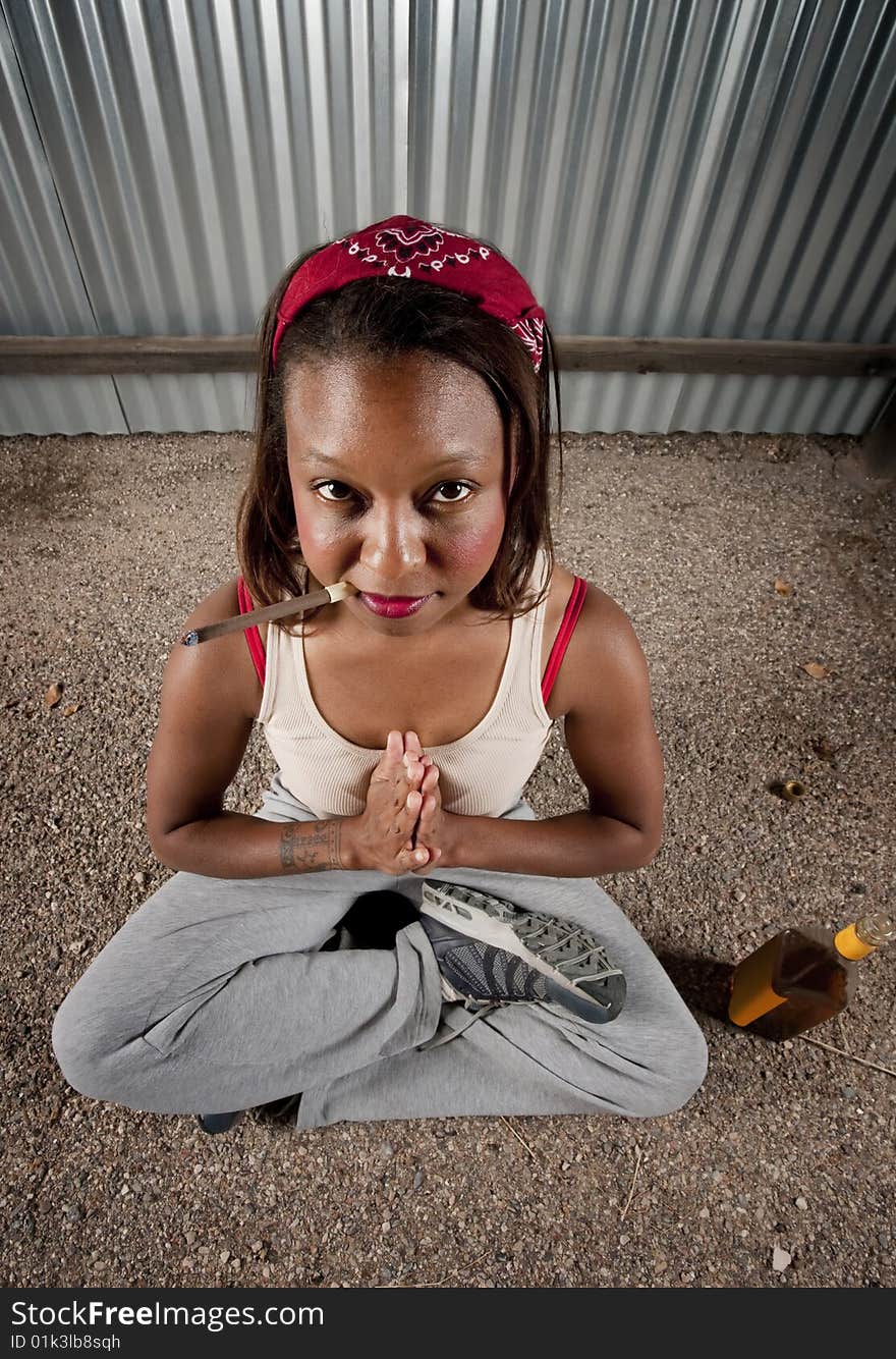 Cigar smoking and drinking woman meditating