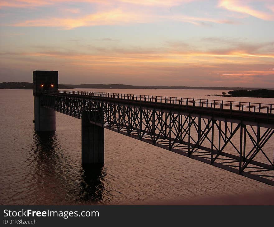 Watchtower at the Canyon Lake Dam in Sattler, Texas Hill Country at sunset. Watchtower at the Canyon Lake Dam in Sattler, Texas Hill Country at sunset