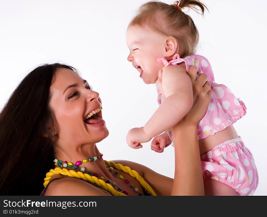 Little girl with beautiful mother