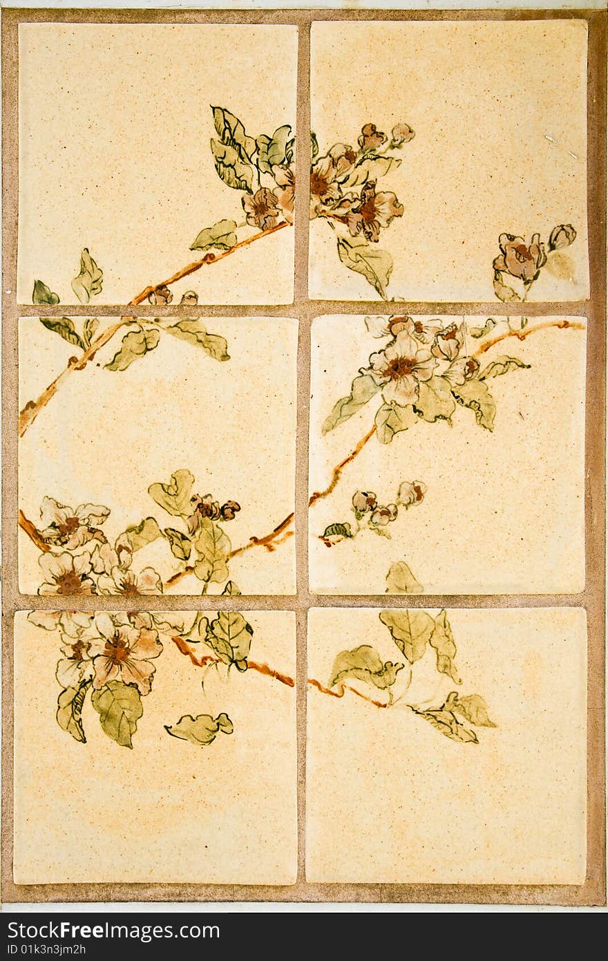 Floral pattern made from ceramic tiles - closeup wall decoration