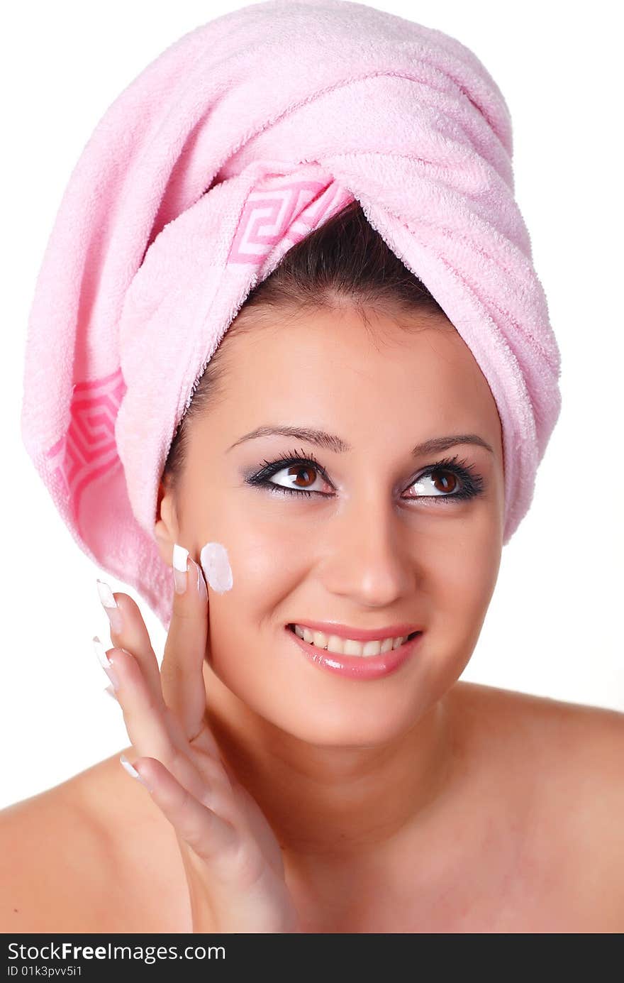 Portrait of woman in pink towel on her head. Portrait of woman in pink towel on her head