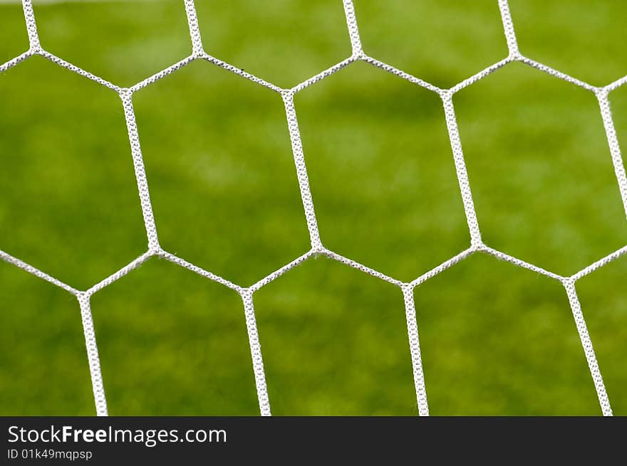 White grid of football gate on a green background. White grid of football gate on a green background.