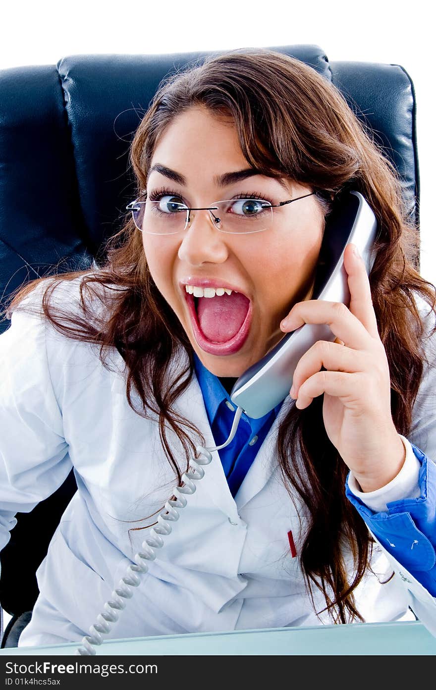 Female doctor posing with phone on an isolated background