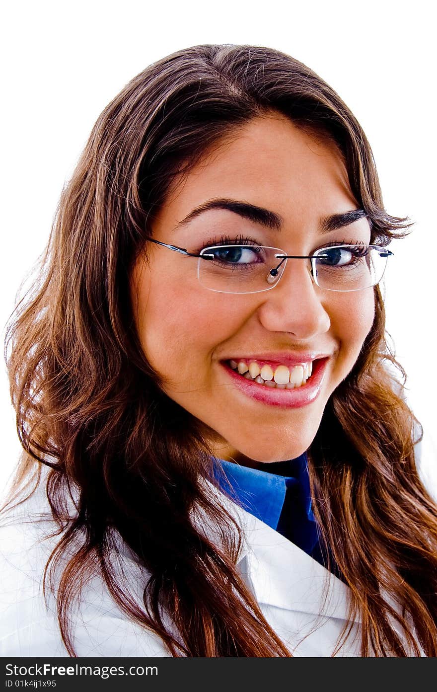 Portrait of young happy doctor against white background