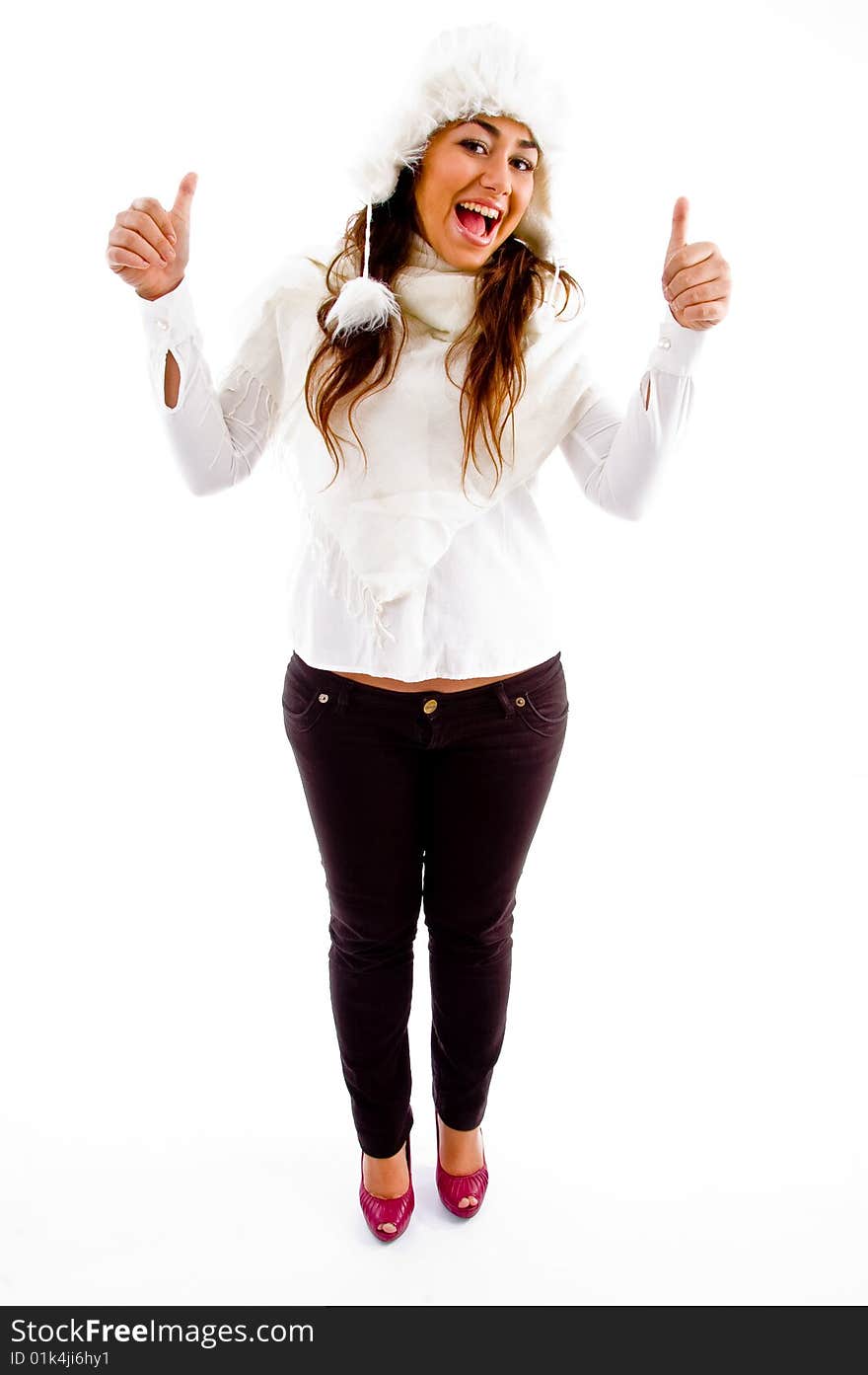 Pleased female with thumbs up on an isolated background