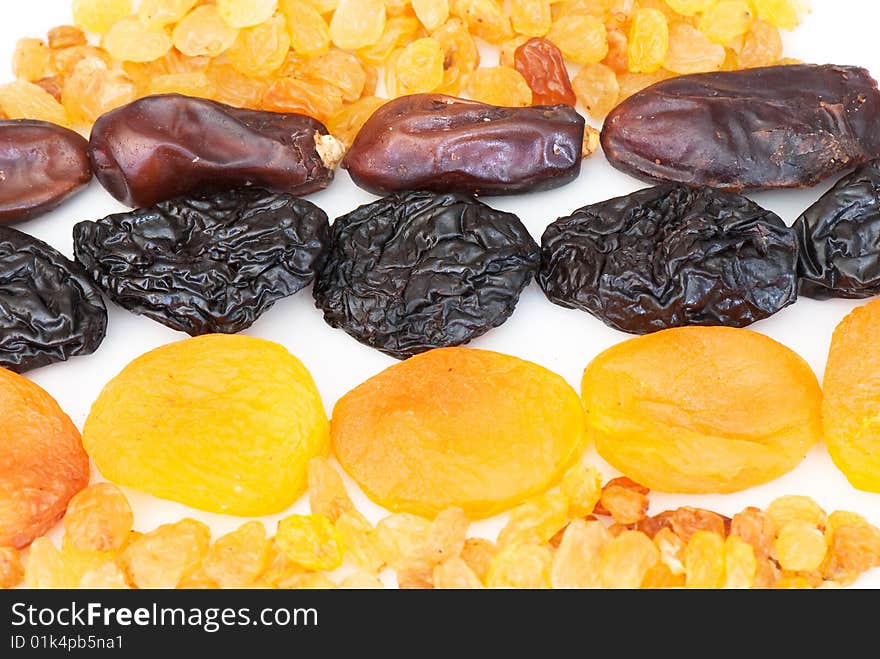 Composition from dried fruits on a light background