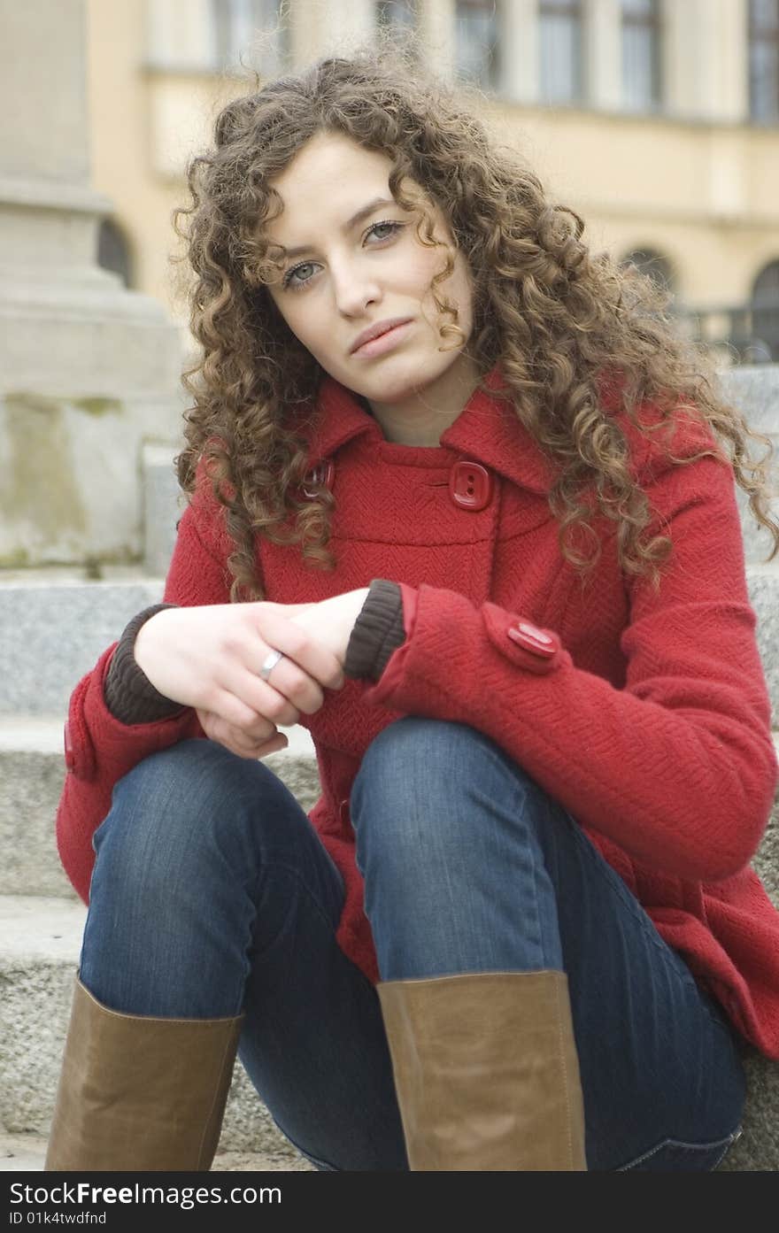 Teenager Sitting On Stairs