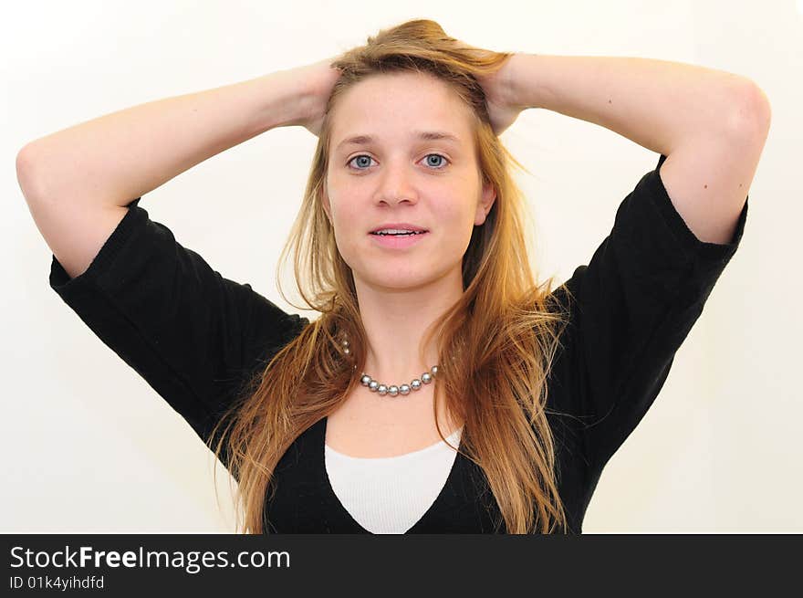 Attractive red head girl on white background in jblack shirt. Attractive red head girl on white background in jblack shirt