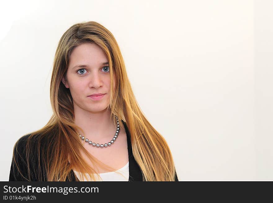 Attractive red head girl on white background in black shirt. Attractive red head girl on white background in black shirt