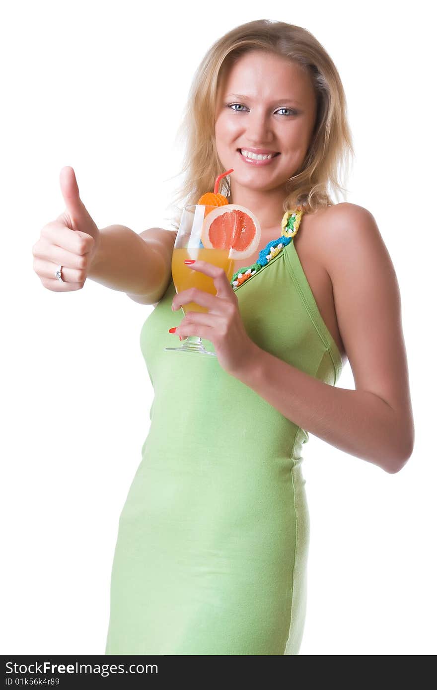 Beautiful girl in a green dress with a cocktail isolated on a white background. Beautiful girl in a green dress with a cocktail isolated on a white background