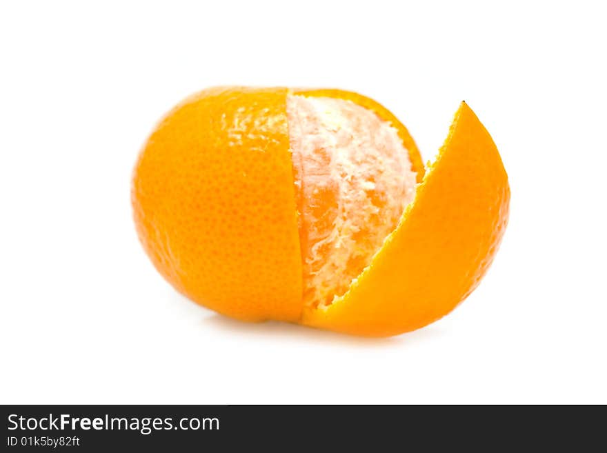 Ripe yellow mandarine on a white background