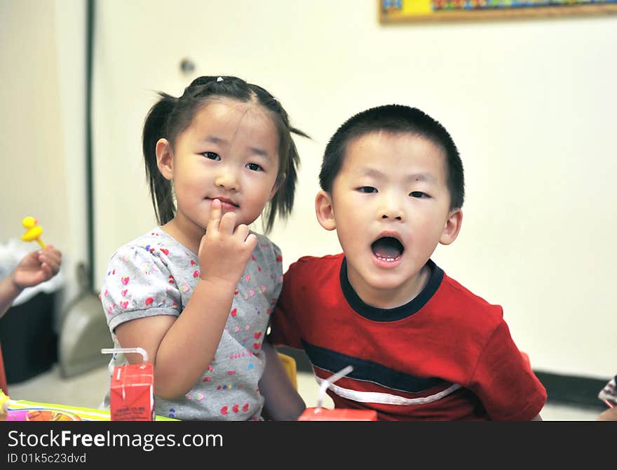 Little Chinese girl with her brother together. Little Chinese girl with her brother together.