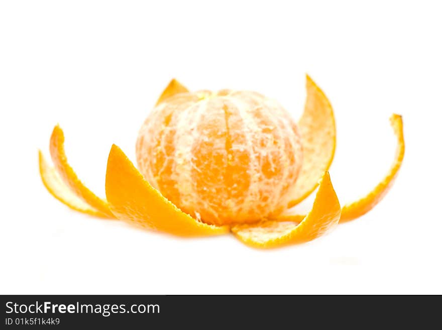 Ripe yellow mandarine on a white background