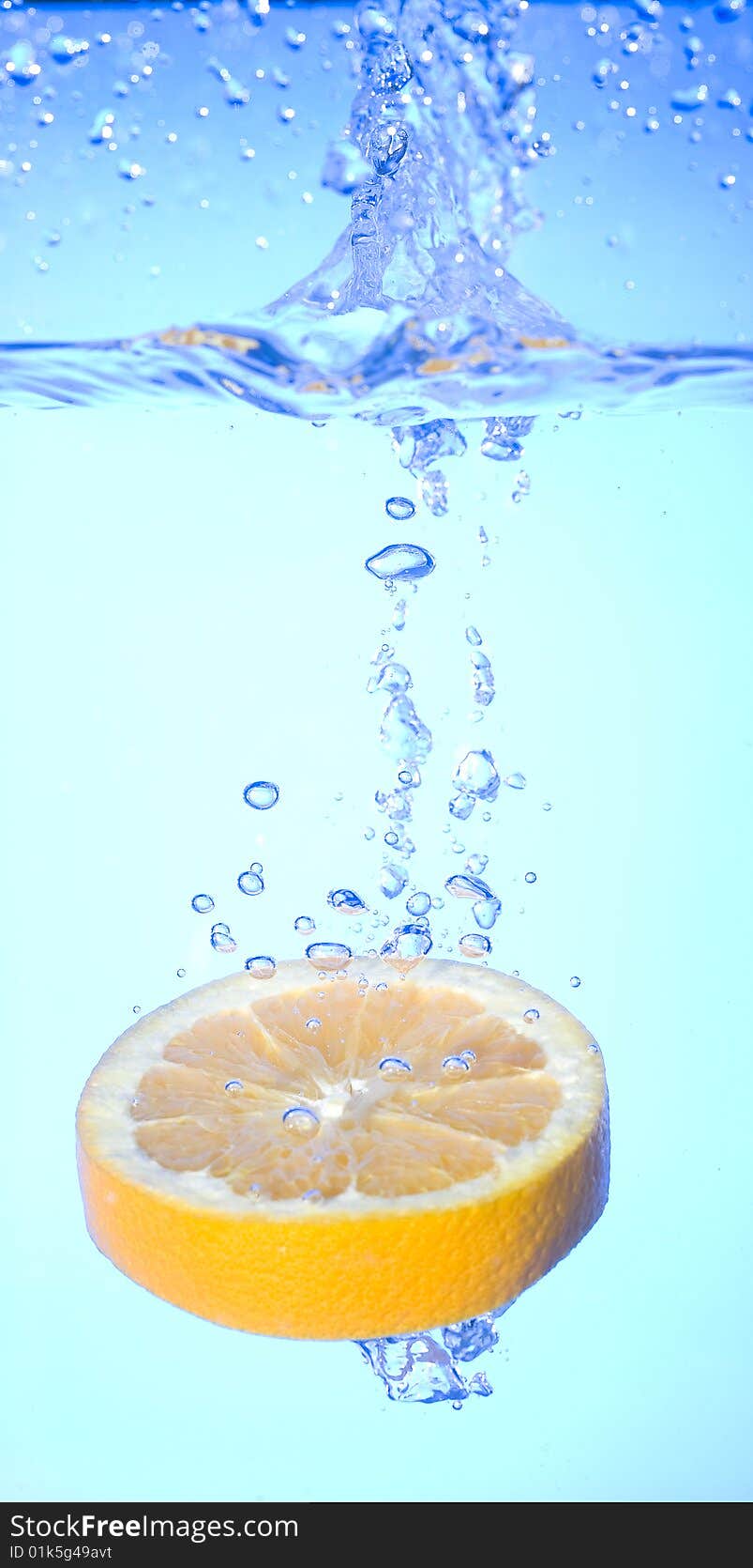 Orange with creative splashing water