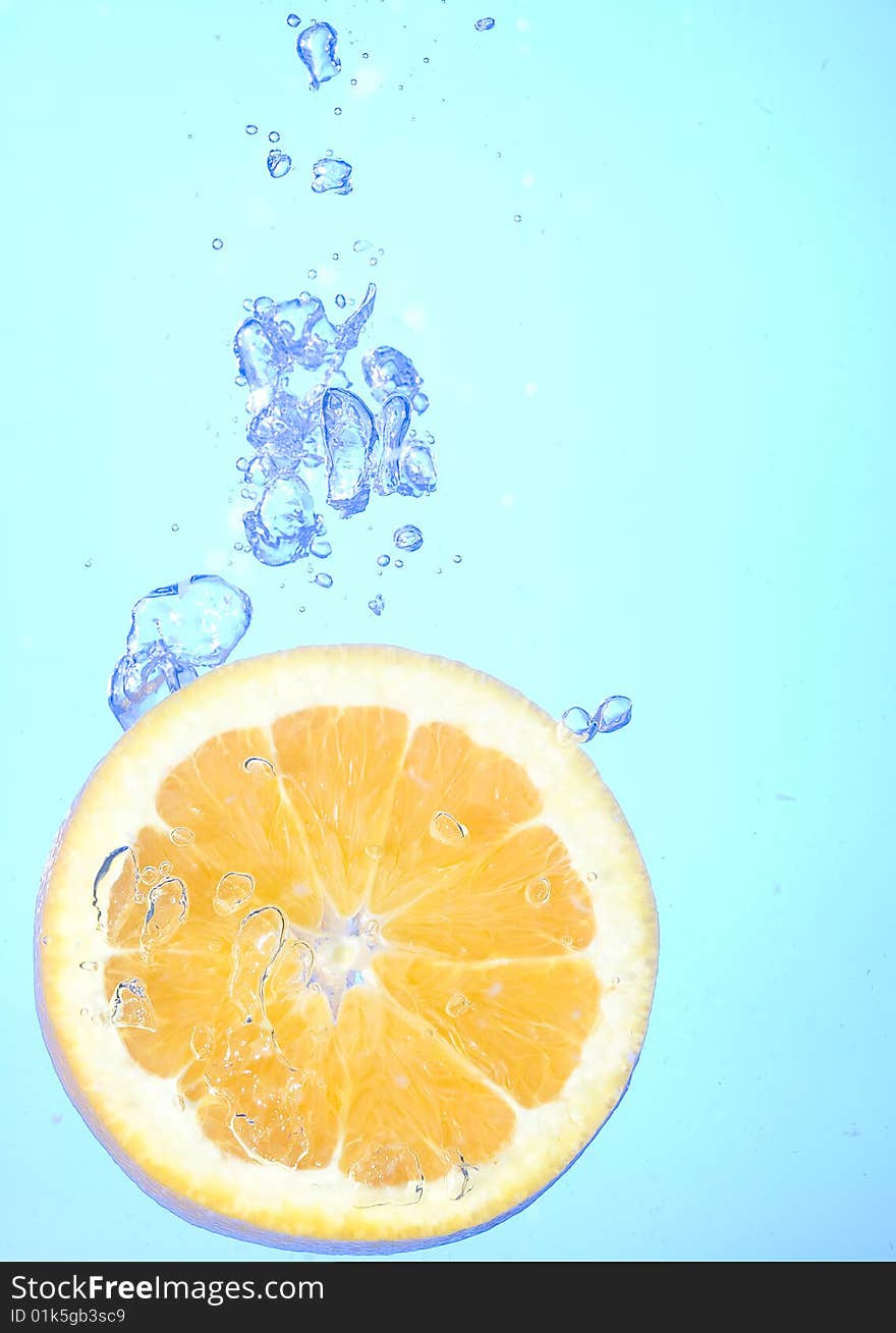 Orange with creative splashing water