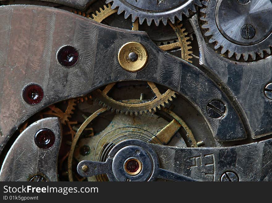 Close-up of old watch mechanism as background