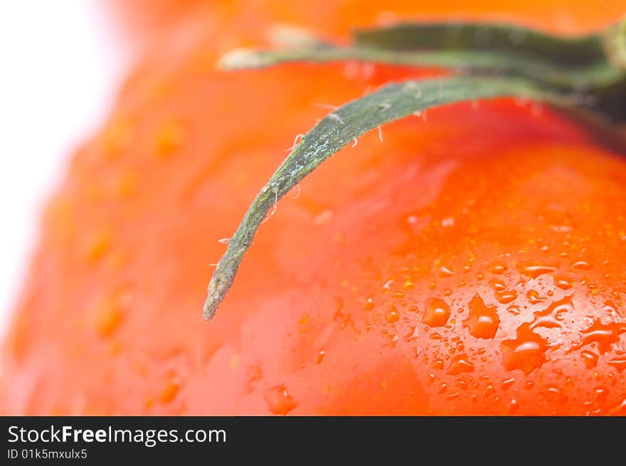 Red fresh tomato isolated on white