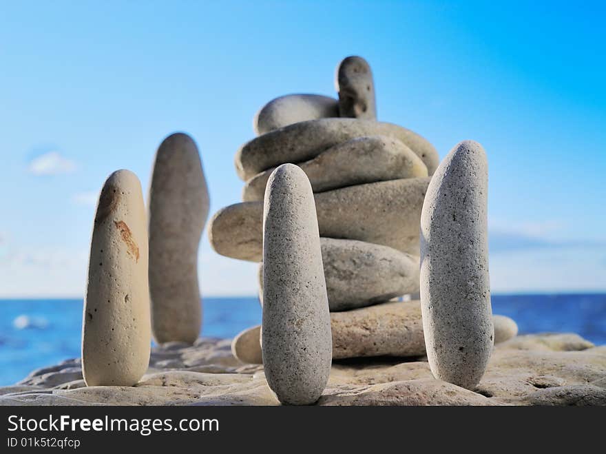 Group of cobble-stones on the shores of ocean as an ancient symbol. Group of cobble-stones on the shores of ocean as an ancient symbol