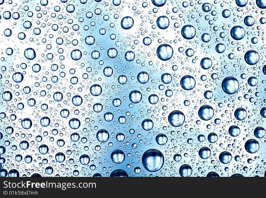 Water drops on glass background. Water drops on glass background