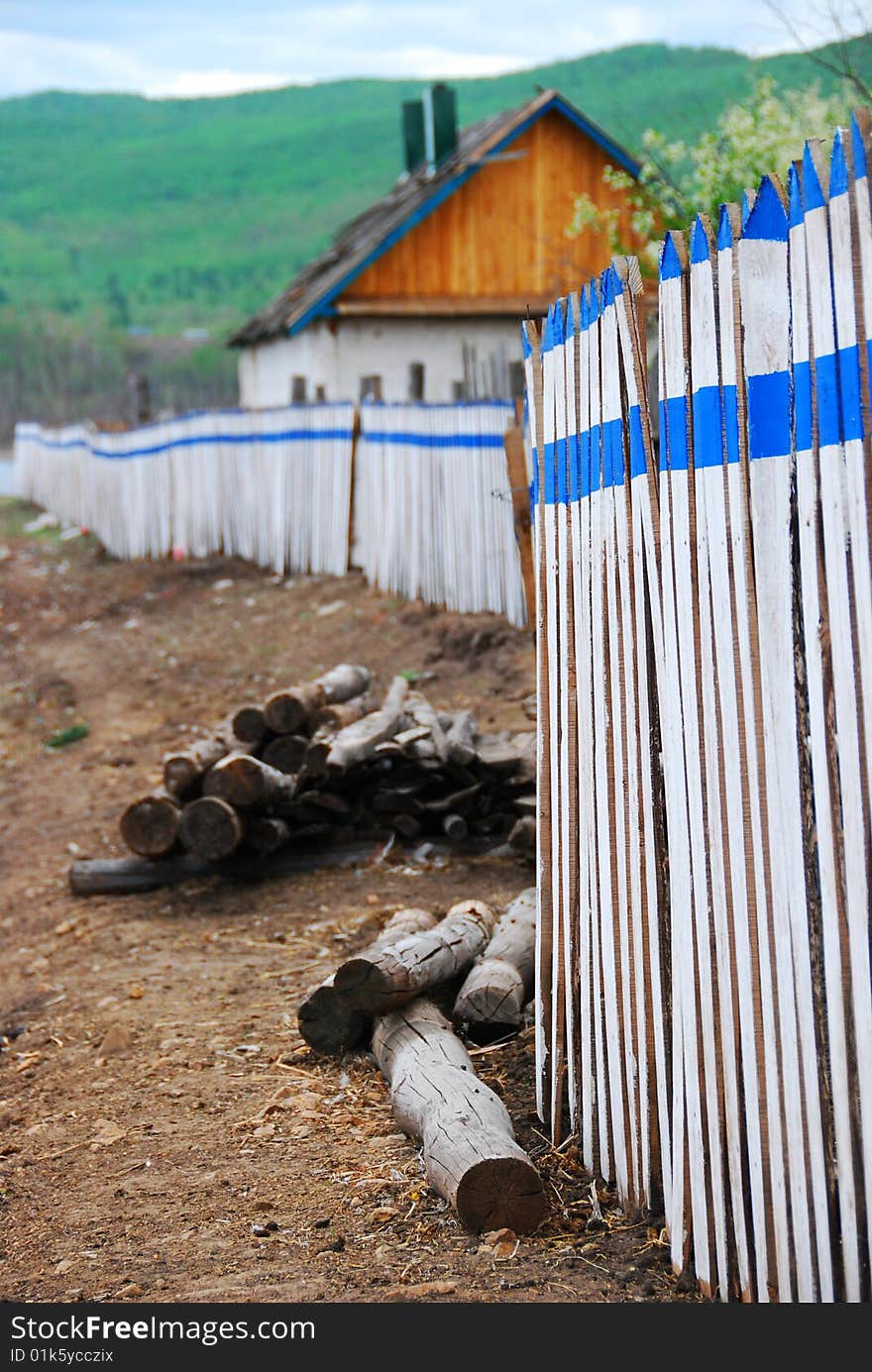 Fence and cottage