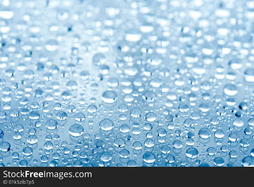 Water drops on glass background. Water drops on glass background