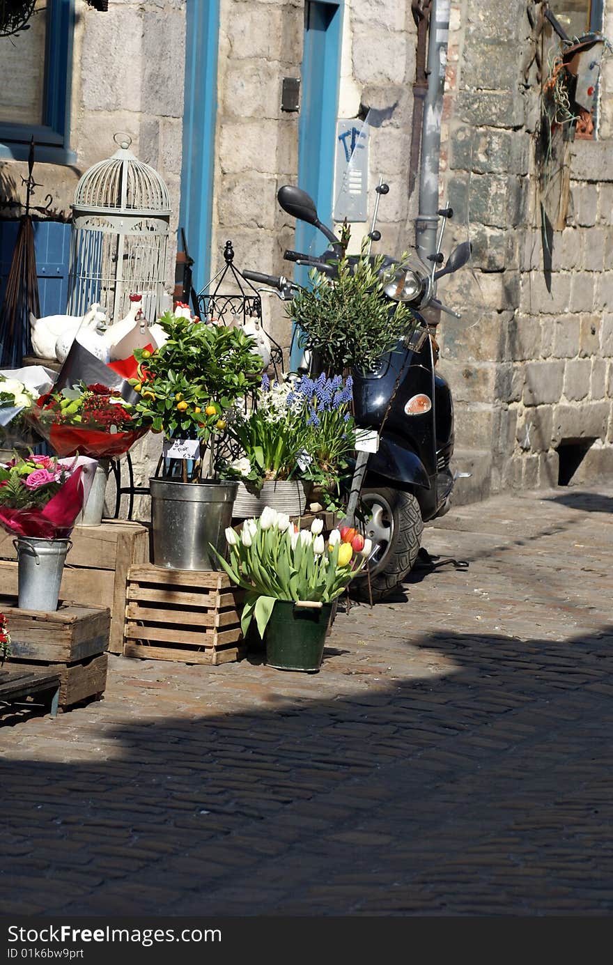 Black scooter in terrace : perfume of Italy