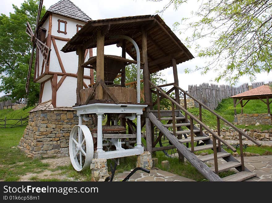 Windmill and grits cutter in a rural museum