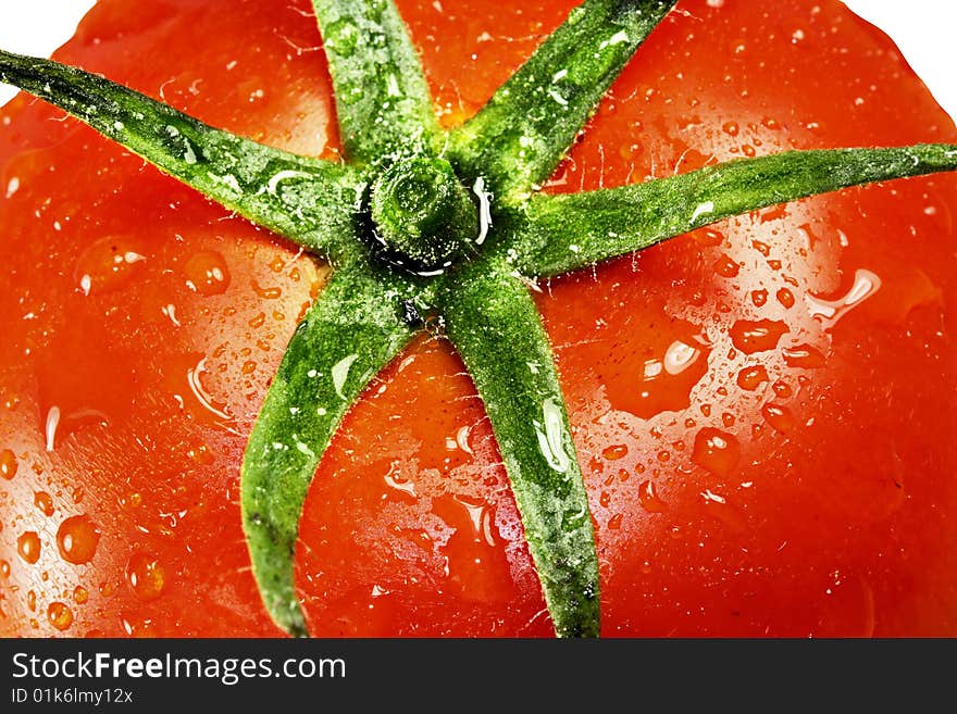 Juicy red tomato  with water droplets on it