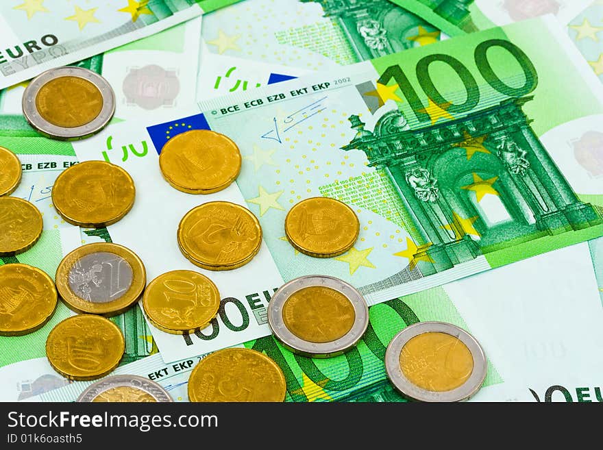 Euro coins and banknotes, abstract business background