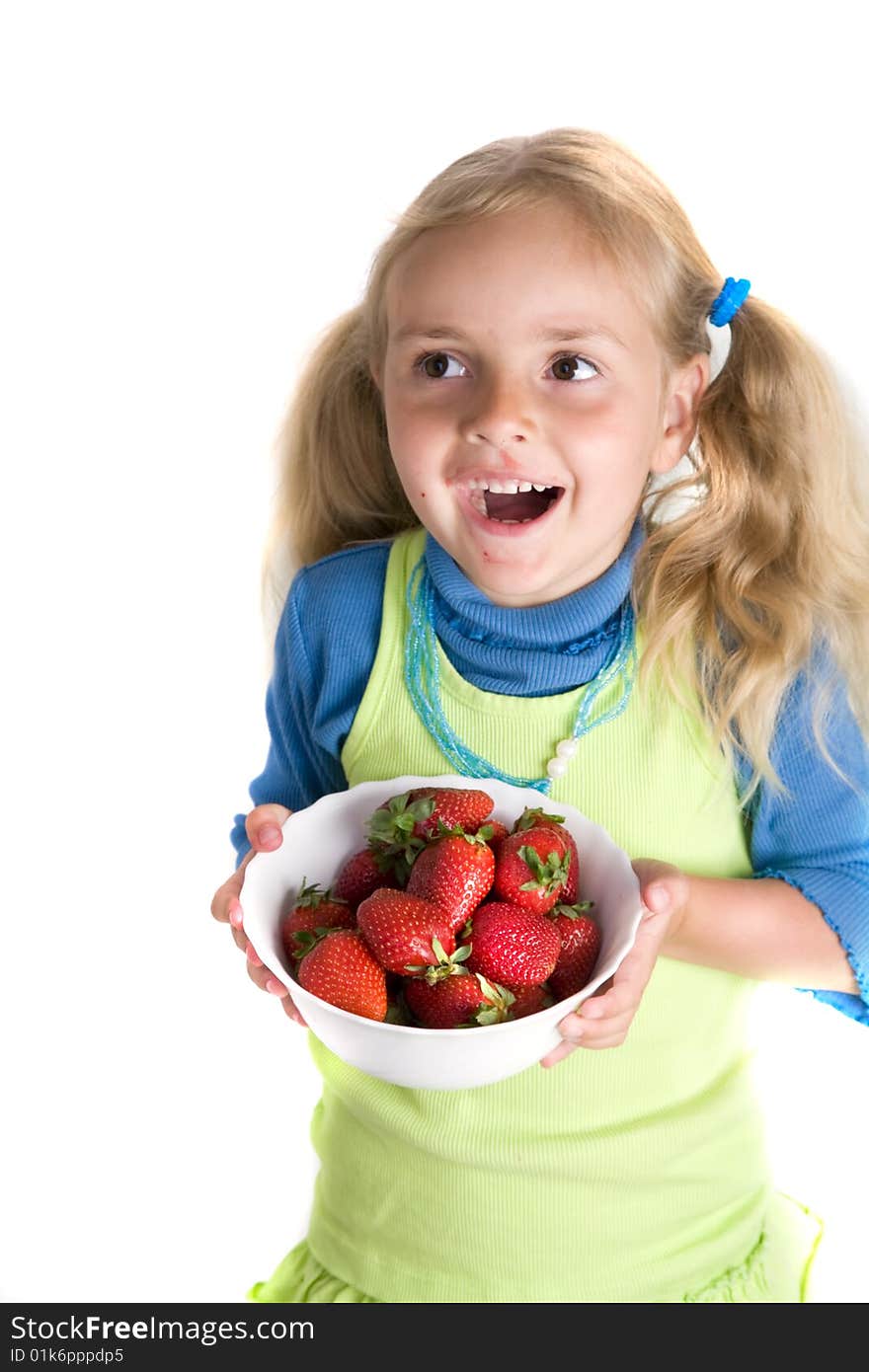 Little girl with strawberries