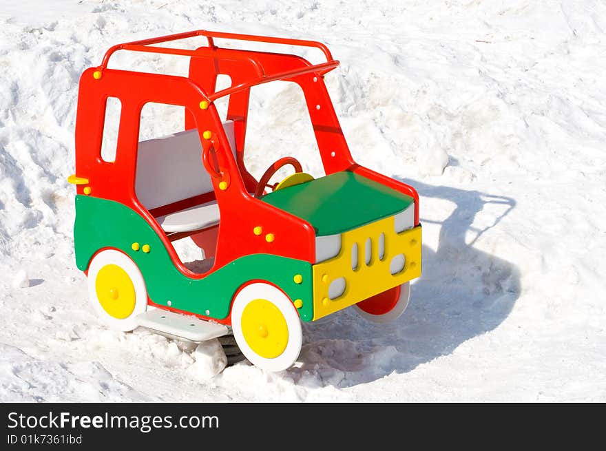 Colorful toy car on the playground