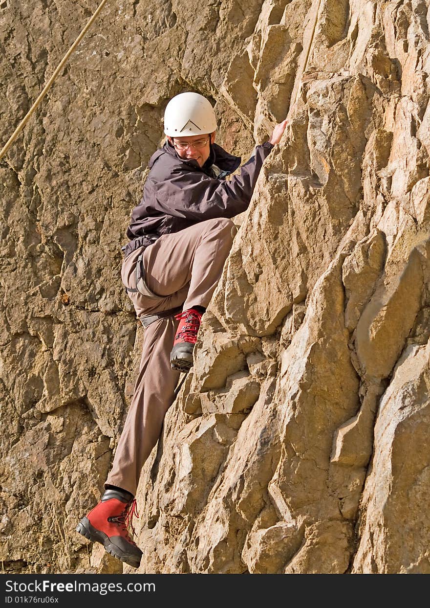 Mountaineering competition with climber on the wall