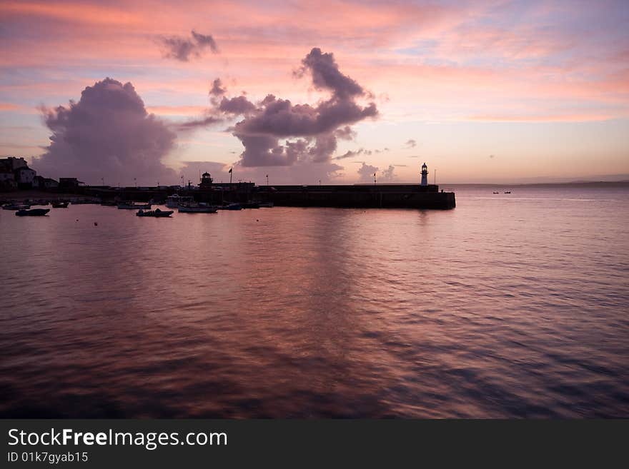 Dawn over the harbor in St Ives, Cornwall, UK. Dawn over the harbor in St Ives, Cornwall, UK