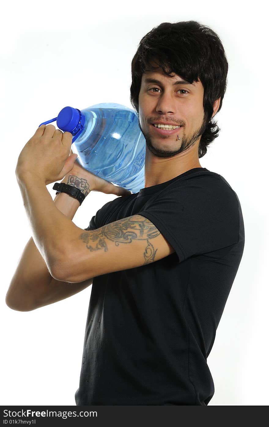 Portrait of young hispanic man carrying water bottle isolated