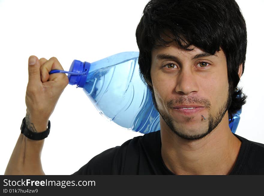 Portrait of young hispanic man carrying water bottle isolated