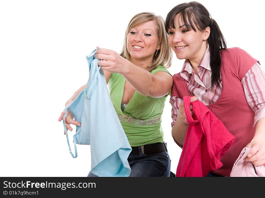 Two attractive women with clothes. Two attractive women with clothes.