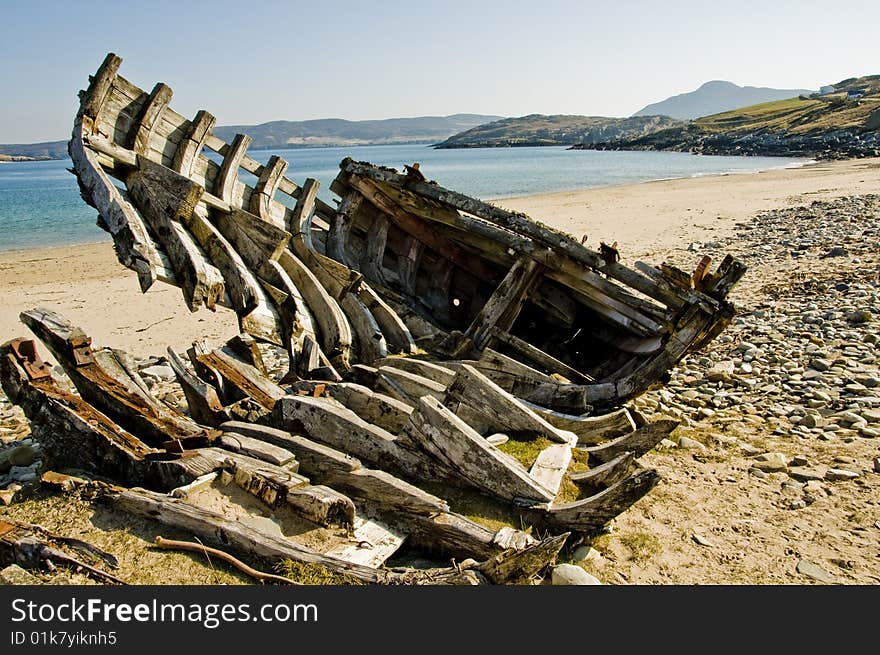 Wrecked Boat On The Sea Shore