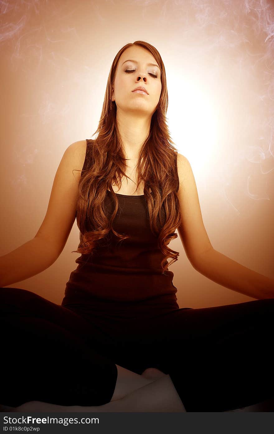 Young woman is doing an expert yoga exercise