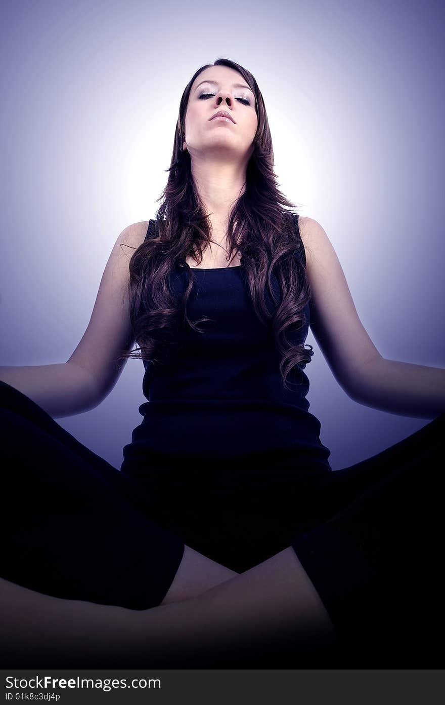 Woman is doing an expert yoga exercise