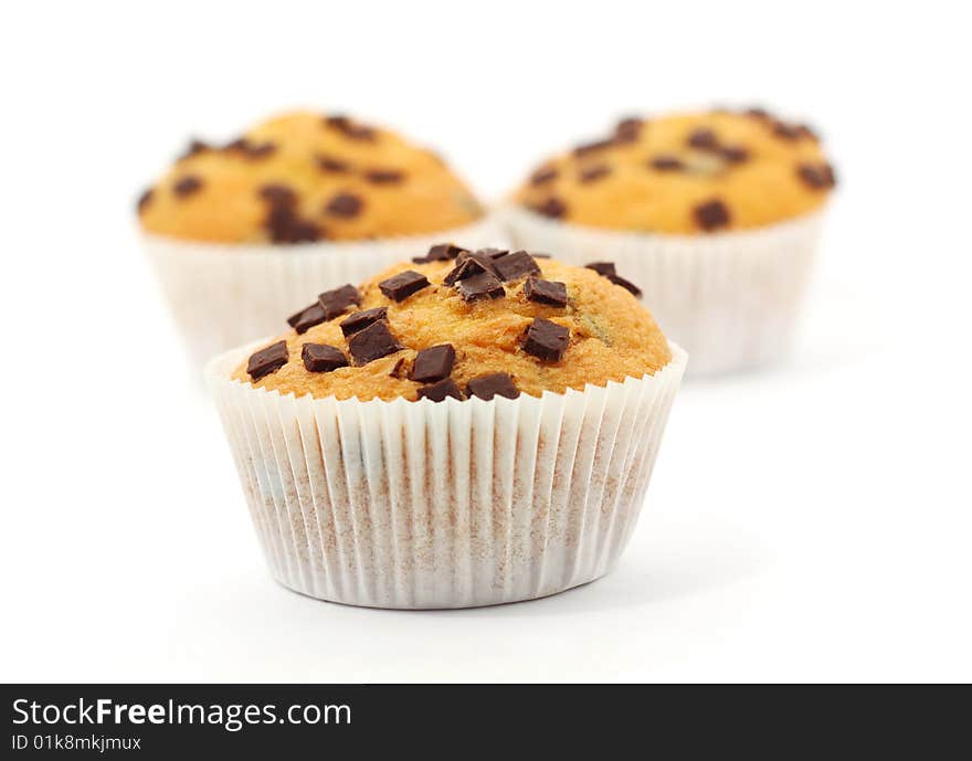 Three muffins isolated on a white background