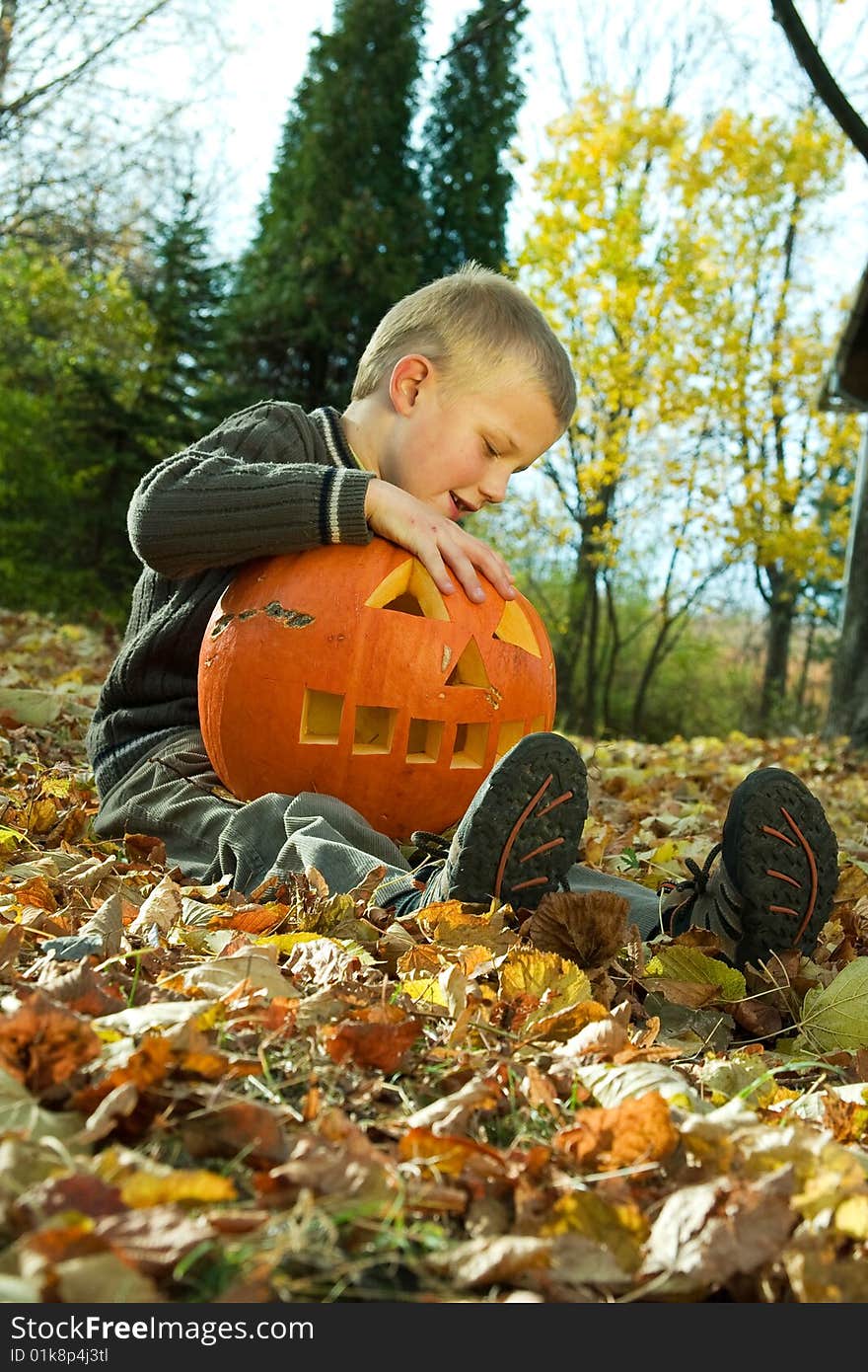 Little boy with halloween pumpkin. Little boy with halloween pumpkin