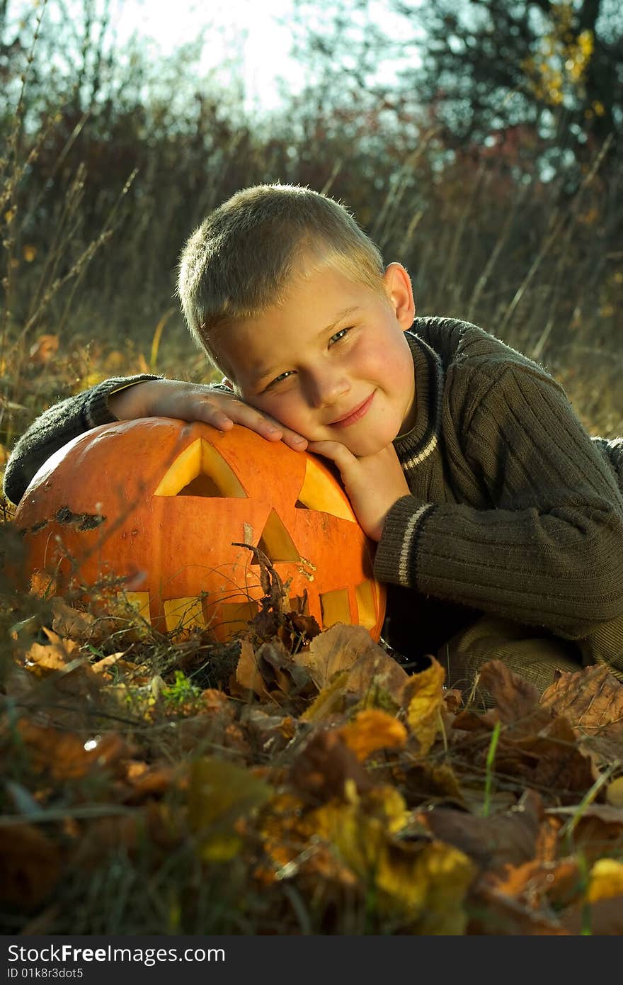 Little boy with halloween pumpkin. Little boy with halloween pumpkin