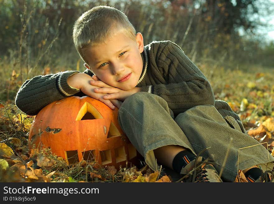 Little boy with halloween pumpkin. Little boy with halloween pumpkin